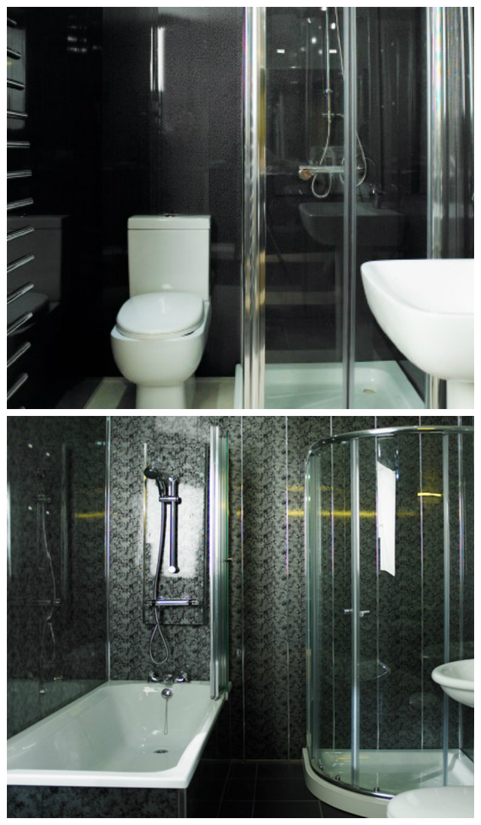 Интерьер ванной с черными пластиковыми панелями