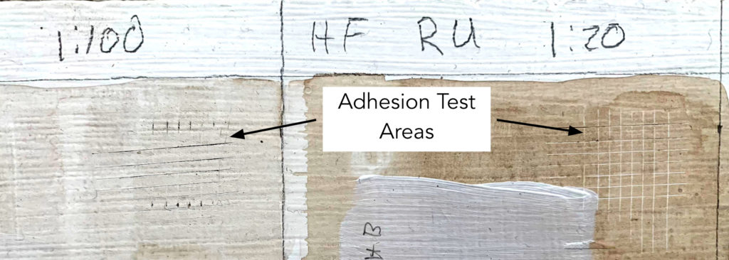 Cross hatch adhesion tests of High Flow Raw Umber thinned 1:100 and 1:20 with water.