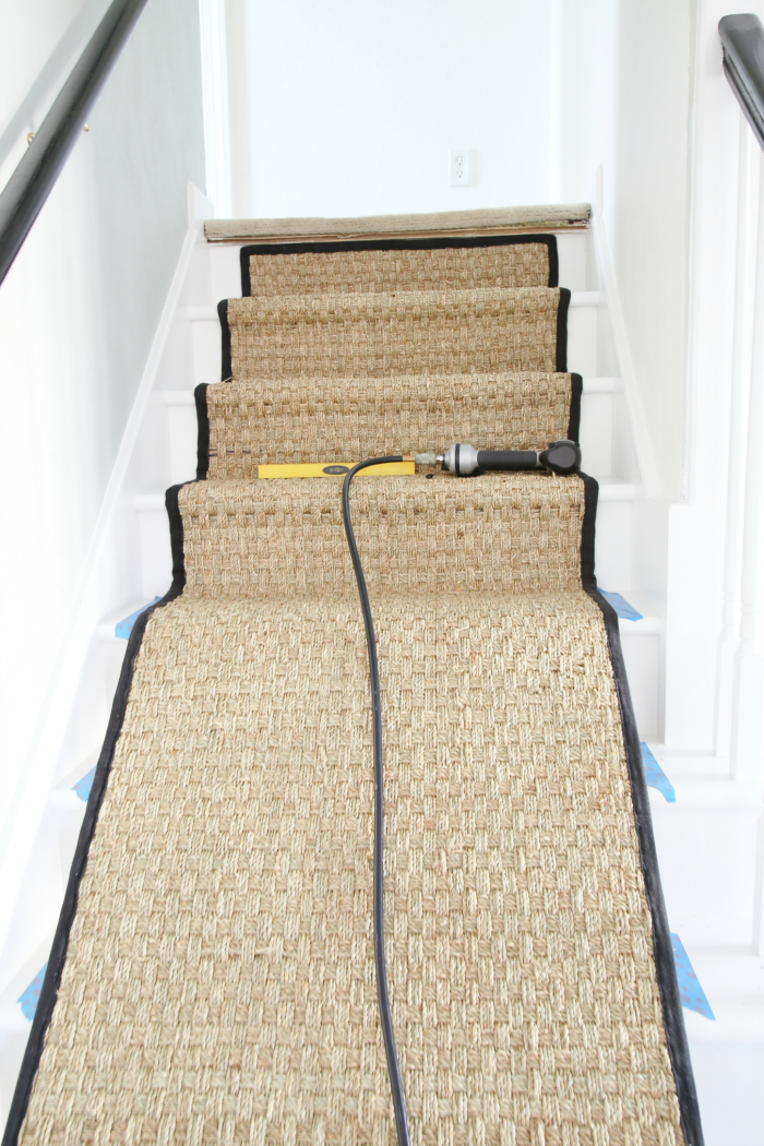 Installing a Seagrass Stair Runner - White Painted Staircase Makeover with Seagrass Stair Runner Tutorial