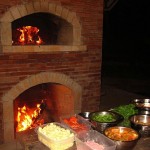 Fireplace under pizza-oven.